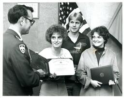 Three Students Receiving ROTC Scholarship Awards (Part of the NMU Historic Photographs Collection)