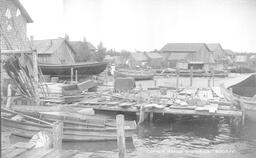 Docked Fishing Boats and Buildings