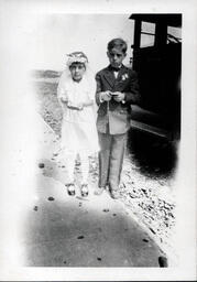 Young Tom Ross and Girl at First Communion