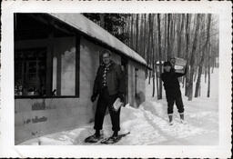 Men on Snowshoes Carrying Boxes